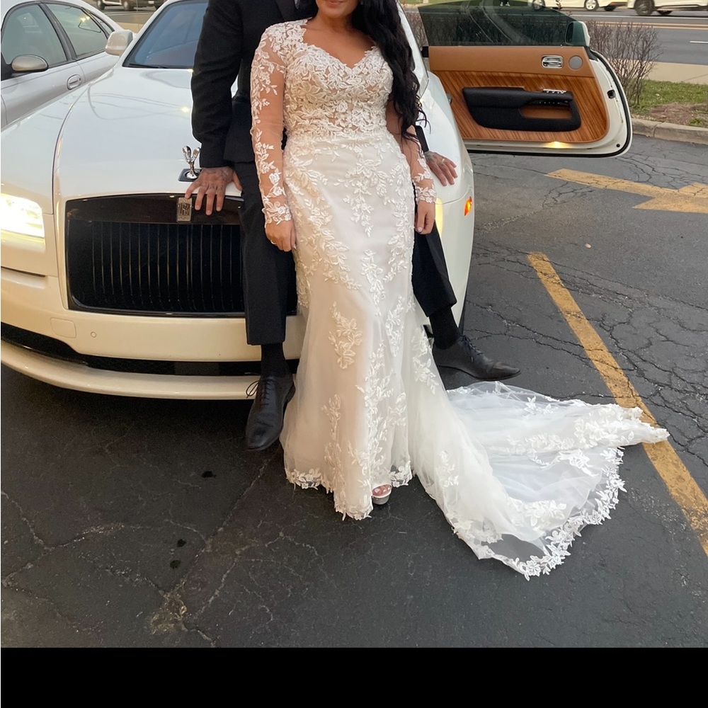 Maggie Sottero size 12 wedding dress. Gently worn. Beautiful intricate lace.